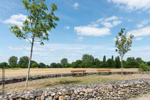 Galvanized gabion box filled with rocks. Nature park architecture landscaping