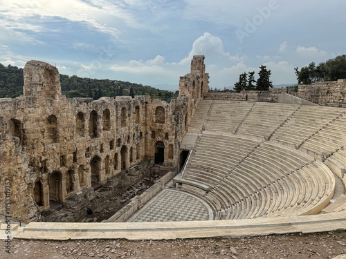 Ancient Odeon of Herodes Atticus Amphitheater Ruins With Tiered Stone Seats And Arched Walls, Athens Greece