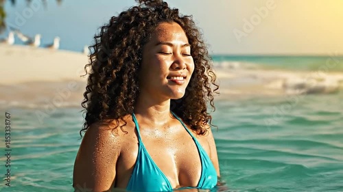Young Woman with Curly Hair in Blue Bikini Enjoying Ocean with Birds in Summer Holiday Vacation Scenic Beach Backdrop and Turquoise Water Under