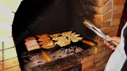 BBQ and Grill. Outdoor picnic with grilled meat. Meat grilled over coals in an outdoor oven. Meat snacks and food. 4k footage