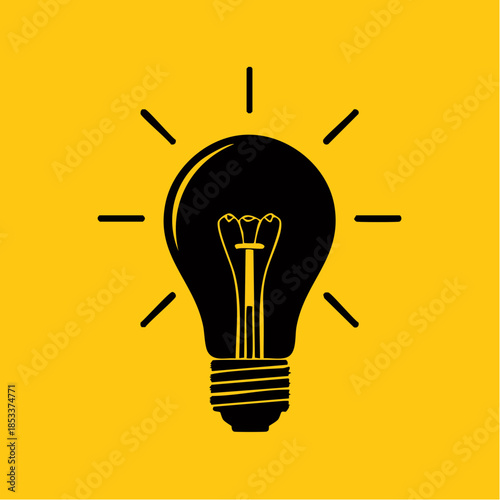 A bright idea illuminated by a classic light bulb on a yellow background