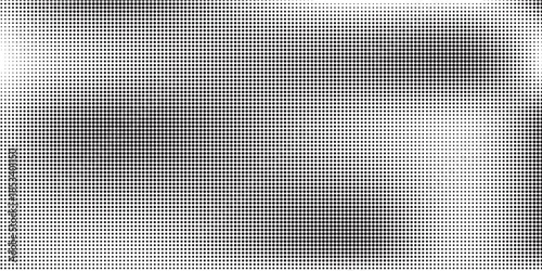 Dotted halftone gradient texture. Fading polka dot background. Repeated dots gradation pattern. Black vanishing comic pop art overlay backdrop. Halftone raster effect wallpaper. Vector Ilustration