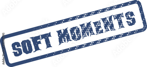 Soft Moments text displayed on a weathered indigo rubber stamp for quiet reflection