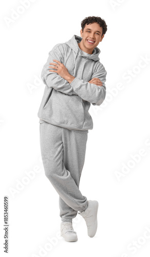 Young man in grey sports su...