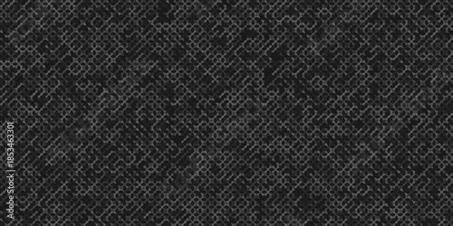 Dark grey digital pattern featuring a dense network of thin, interconnected geometric lines forming a complex labyrinth or circuit-like structure on a black background.