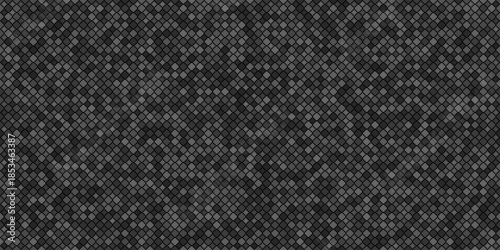 Dark grey digital pattern featuring a dense and uniform mosaic of small pixelated squares creating a textured carbon or tech surface effect.