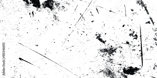 A stark textured background displaying abstract black smudges and linear scratches on a pristine white surface