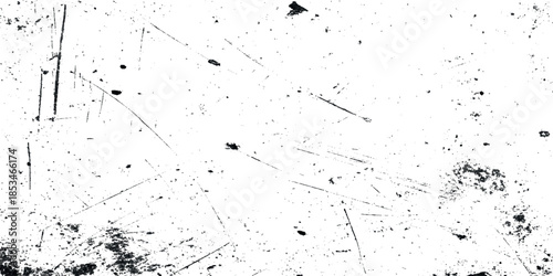 Abstract black and white texture featuring scratches smudges and distressed patterns across a grepsny background