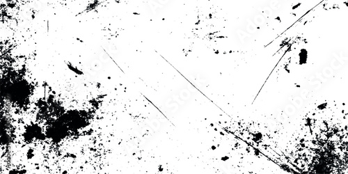 Abstract black and white texture featuring scratches smudges and distressed patterns across a grepsny background