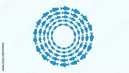 School of fish swimming in a circular pattern creating a vortex.