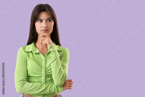 Thoughtful young woman on l...