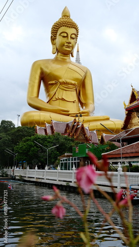 The giant seated buddha statue at the Wat Paknam Phasi Charoen temple, Famous place in Bangkok.
