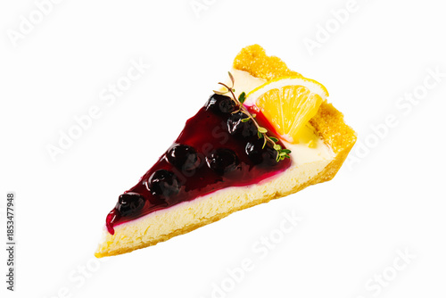 a sliced of blueberry cheese pie with lemon topping isolated on white background including clipping path