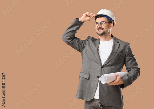 Male architect with house p...