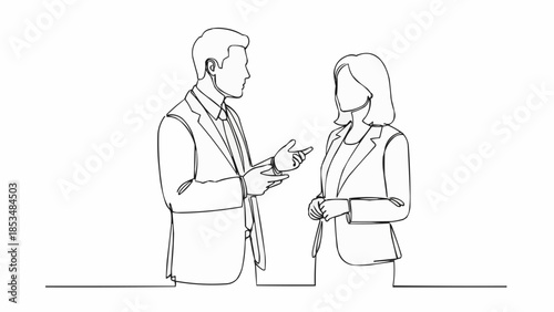 Business professionals engaged in conversation during a meeting.