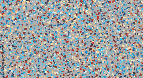 Abstract terrazzo seamless pattern with a mosaic of colorful fragmented shapes in red, blue, and yellow on a neutral gray background.