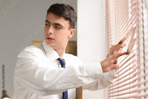 Male FBI agent looking in w...