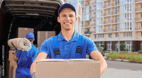 Male mover unloading box on...