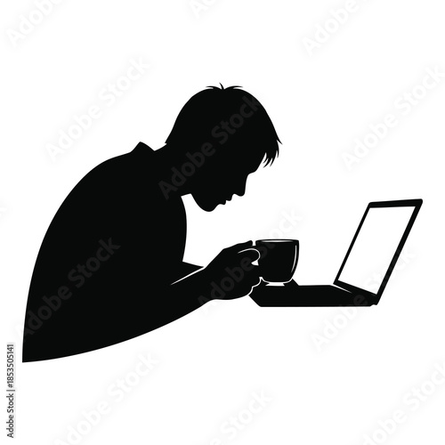 Man working on laptop with coffee cup in hand