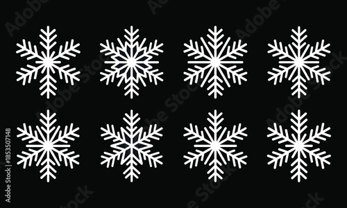 Eight White Snowflakes Arranged on a Black Background winter cold