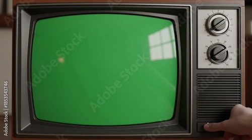 Close Up Footage of a Dated TV Set with Green Screen Mock Up Chroma Key Template Display. Nostalgic Retro Nineties Technology Concept