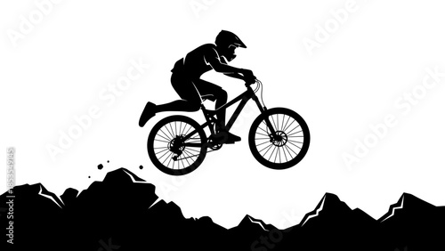 Silhouette of a mountain biker performing a jump against a white backdrop
