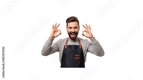 Man in apron gesturing OK sign