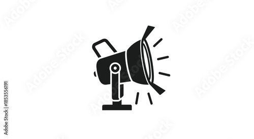 Black silhouette icon of a studio spotlight, representing theater, film production, photography, and the entertainment industry.