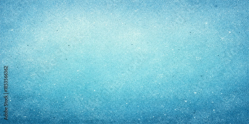 A vintage turquoise watercolor texture creates a blue grunge background with copy space on a rough aged paper canvas for an old textured wall design