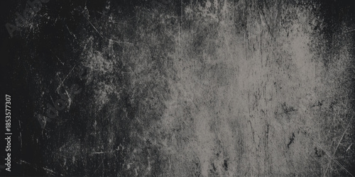A darkly textured grayscale background displays a worn mottled surface with subtle variations in tone and depth