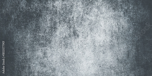 A textured grayscale image showcases a distressed surface with subtle gradients and a weathered appearance