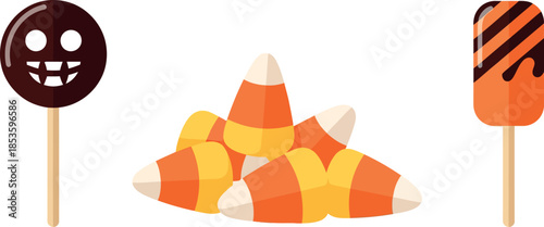 Halloween candy on sticks and pile of mini orange traffic cones for decoration