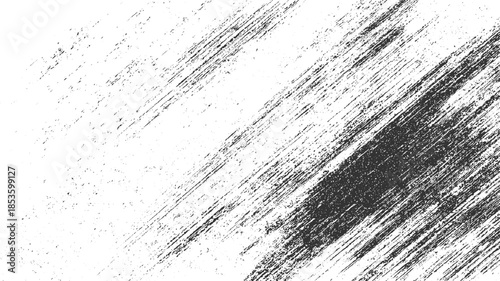 Black diagonal brush strokes and speckles on white background abstract texture