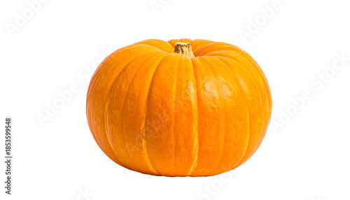Vibrant orange pumpkin with vertical ridges sits isolated against a stark black background