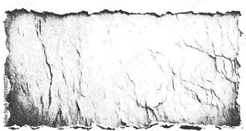 Black and white stippled texture of torn paper edge with rough edges and creases