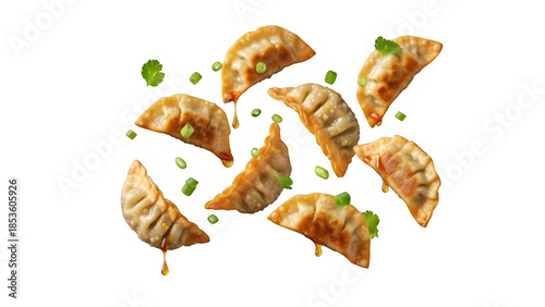 Wallpaper Mural Fried Gyoza dumplings flying falling, isolated on white or transparent background. PNG Torontodigital.ca