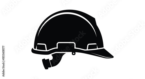 A striking black and white image depicting a construction helmet in a bold silhouette