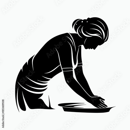 Woman kneading dough in kitchen silhouette with focused posture  