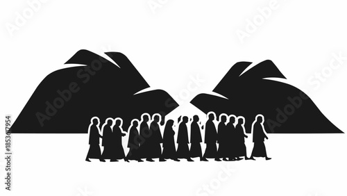 Silhouettes of people walking between two large mountains.