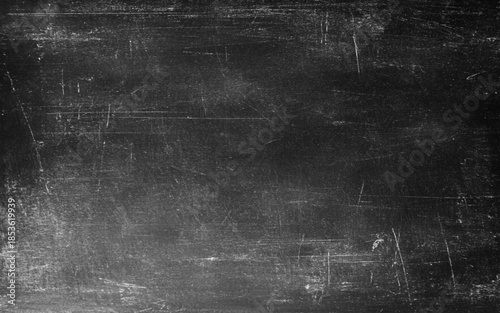 Empty blank plain black colored grunge textured rustic smudged stained scratched cracked mottled wall vector vintage horizontal background
