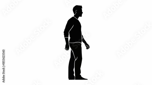 Silhouette of a man standing and looking to the side.