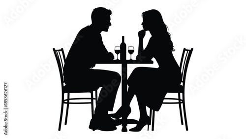 A romantic dinner for two at a table featuring a striking silhouette