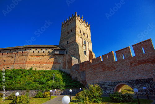 A view from below of the fortress walls and tower with the main gate of Lubart Castle in Lutsk, Volyn Oblast, Ukraine