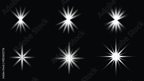 White Starburst Sparkle Light Effects Set on Black Background