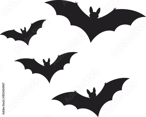 Four Black Silhouette Bats Flying Against White Background animal creature