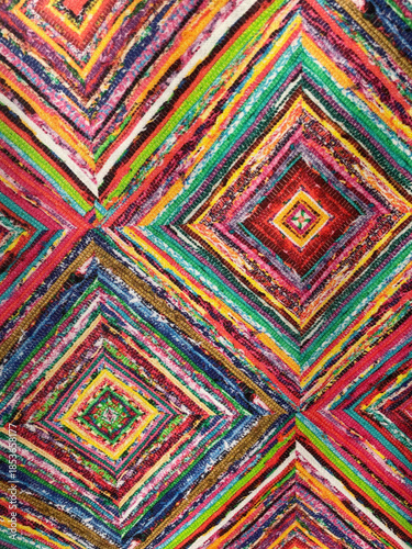 Obraz na płótnie Colorful woven textile pattern with geometric diamond shapes