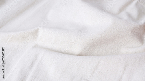Fotografie Calico fabric background in cream color