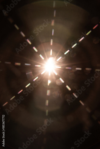 Abstract sun flare. The lens flare is subject to digital correction