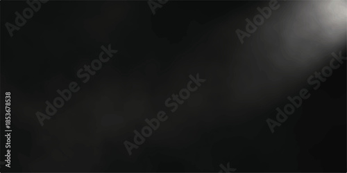 A spotlight pierces the dark smoke and fog, creating a dramatic, textured image against a black backdrop