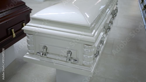 Modern white coffin premium level at the exhibition in the store